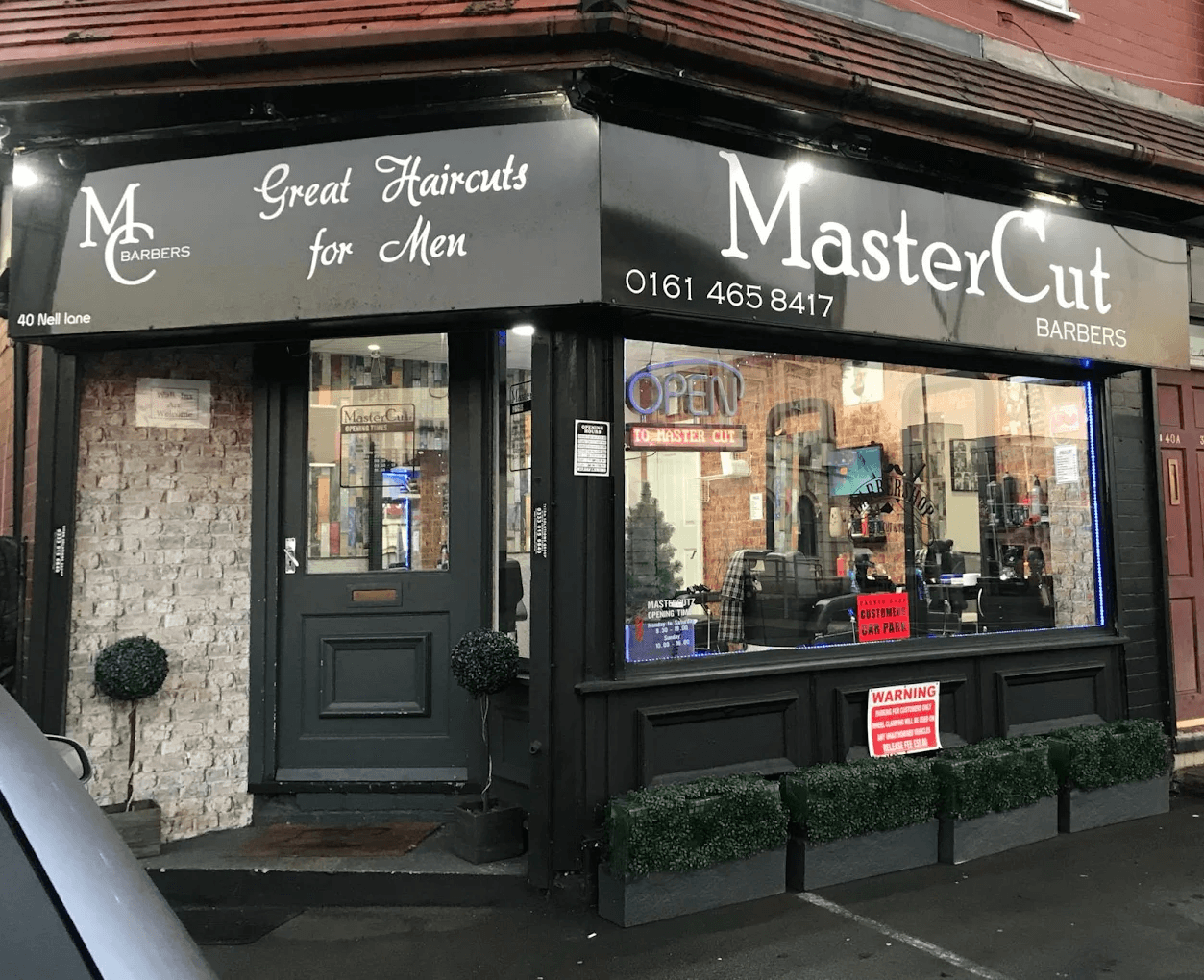 Mastercuts barbershop storefront in Chorlton, Manchester - professional men's haircuts and grooming services